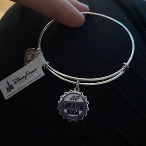 Brand new Disney Pixar Alex and Ani bracket form movie Up grape soda
